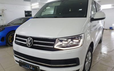 Volkswagen Caravelle — бронирование кузова и стоек дверей пленкой Hexis,  тонировка задних стекол Ultra Vision, боковые стекла атермальной пленкой