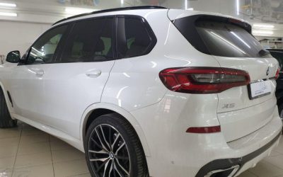 BMW X5 — установка защитной сетки в бампер и тонировка передних боковых стекол пленкой Global 50%