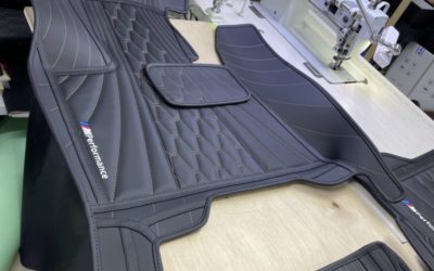 Пошив премиальных ковриков в салон автомобиля BMW X6