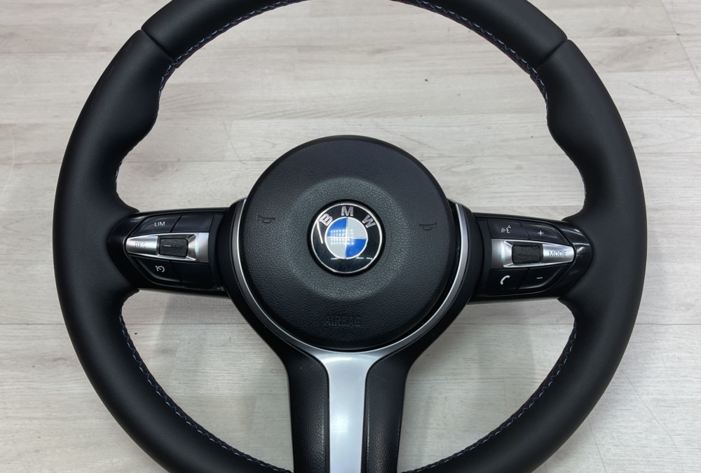 Перетянули обод руля от BMW X5 в качественную износостойкую экокожу