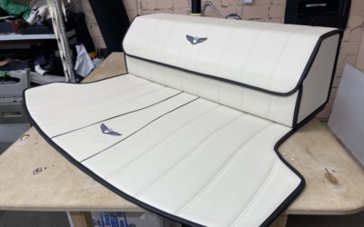 Genesis GV70 — пошив коврика в багажник автомобиля и чемоданчика