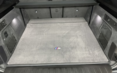 Отшили ворсовый ковёр трансформер в багажник с вышивкой для BMW X5