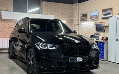 BMW X5 — установка доводчиков дверей и охранного комплекса