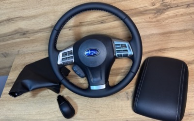 Subaru Forester — перетяжка руля, ручки КПП, кожуха и подлокотника