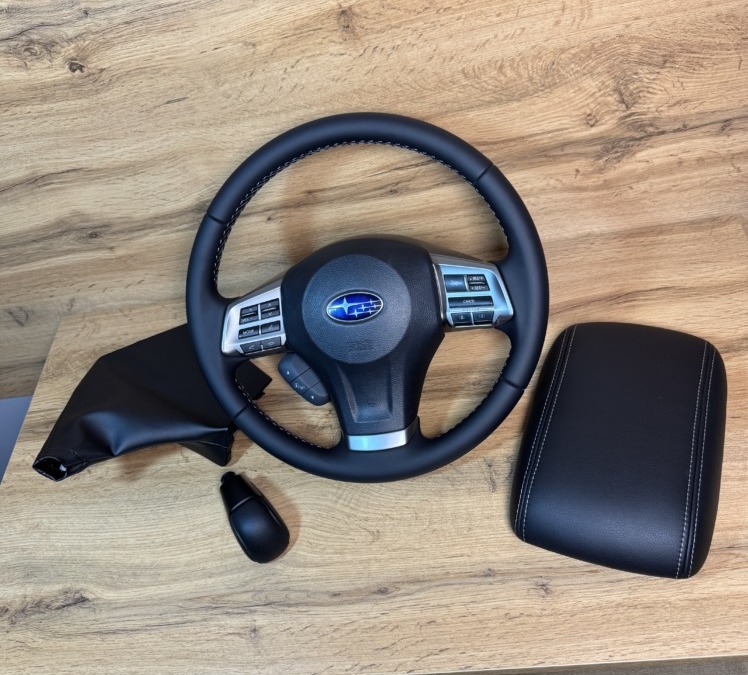Subaru Forester — перетяжка руля, ручки КПП, кожуха и подлокотника