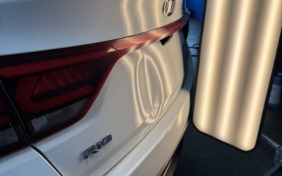 Ремонт объемной вмятины на крышке багажника Kia Rio